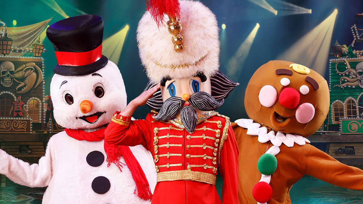 A Snowman, nutcracker, and a gingerbread man standing together at the Pirates Voyage Dinner Show in Pigeon, Forge, Tennessee, USA
